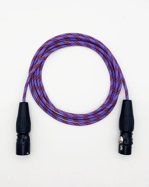 XLR microphone cable in purple, coiled, with male and female XLR connectors